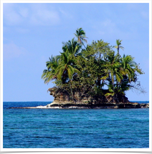 Limestones islets with Coconut Palms - scattered among the Bocas Del Toro archipelago.