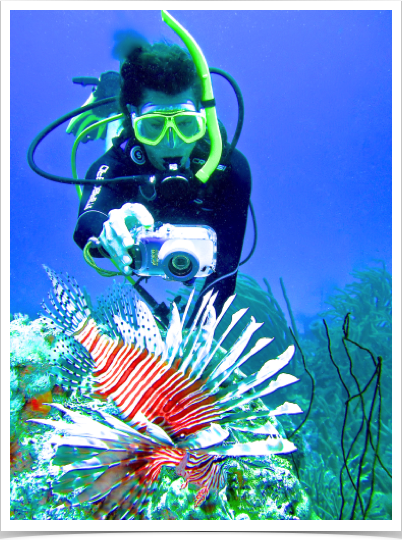 Dr. Alshuth monitoring the affects of invasive Lionfish species on local reef system.