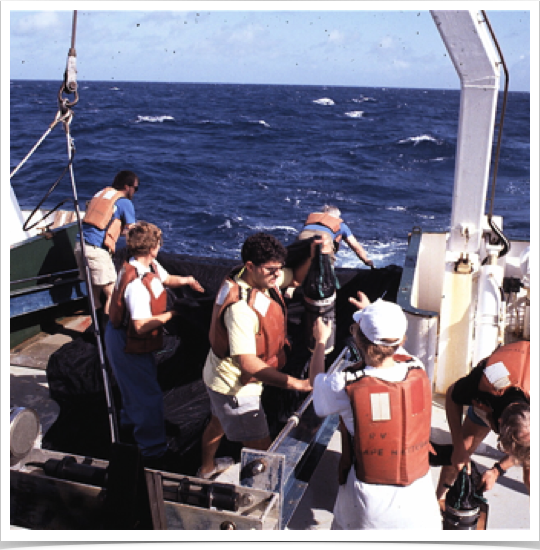 Research team collecting samples from MOCNESS trawl.
